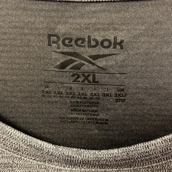 - Brand new with tags Men’s Reebok active tank top. Top has a small thread… - Picture 7 of 16